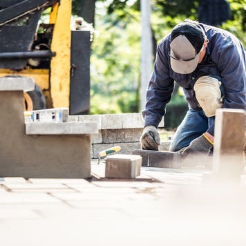 A homeowner makes improvements to an outdoor deck.