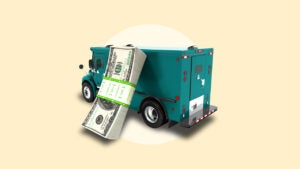 A vehicle with money leaning against it